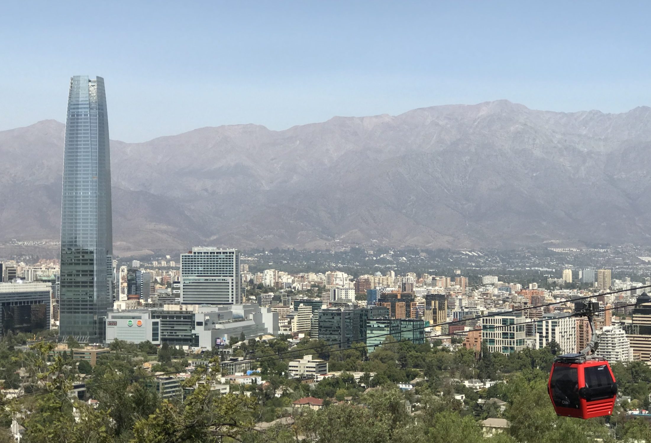 Chile skyline including Costanera Center and the Andes mountain range